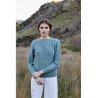 Possum and merino crew neck jersey with lace detail. Mint
