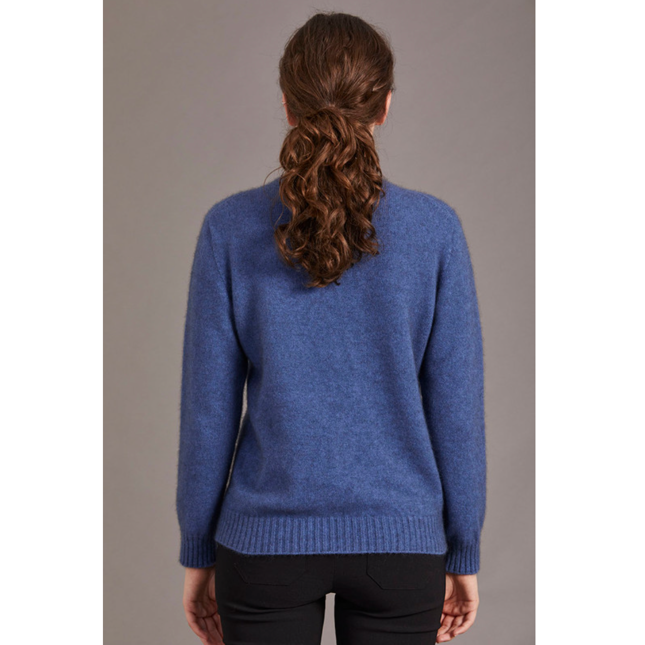 Possum and merino crew neck jersey with lace detail. Orchid