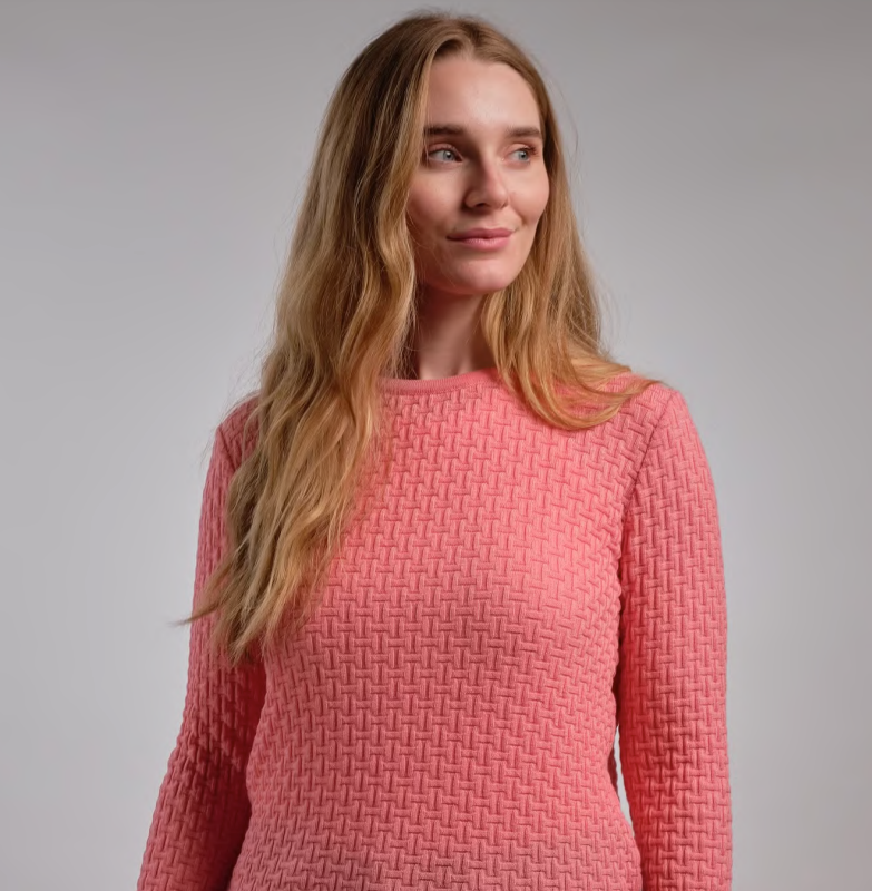 Woman wearing Country Laine - Merino Basketweave Jumper (CL0057) in the colour Peach.