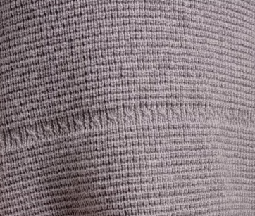 Close up of Country Laine - Merino Waffle Vest (CL0062) in the colour Silver.