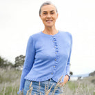 Woman wearing Royal Merino - Frill Trim Cardigan (RM2396) in the colour Cornflower.