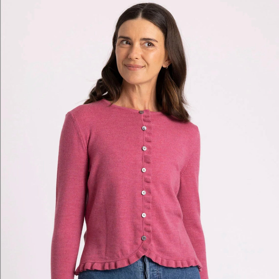 Woman wearing Royal Merino - Frill Trim Cardigan (RM2396) in the colour Azalea.