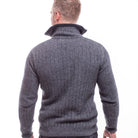 Back view. Male model wearing cable jersey. Grey and black.