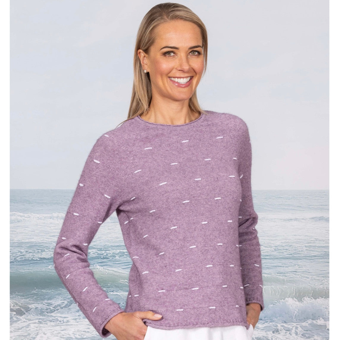 Woman wearing the Showcase Crew in the colour Lilac.