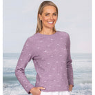 Woman wearing the Showcase Crew in the colour Lilac.
