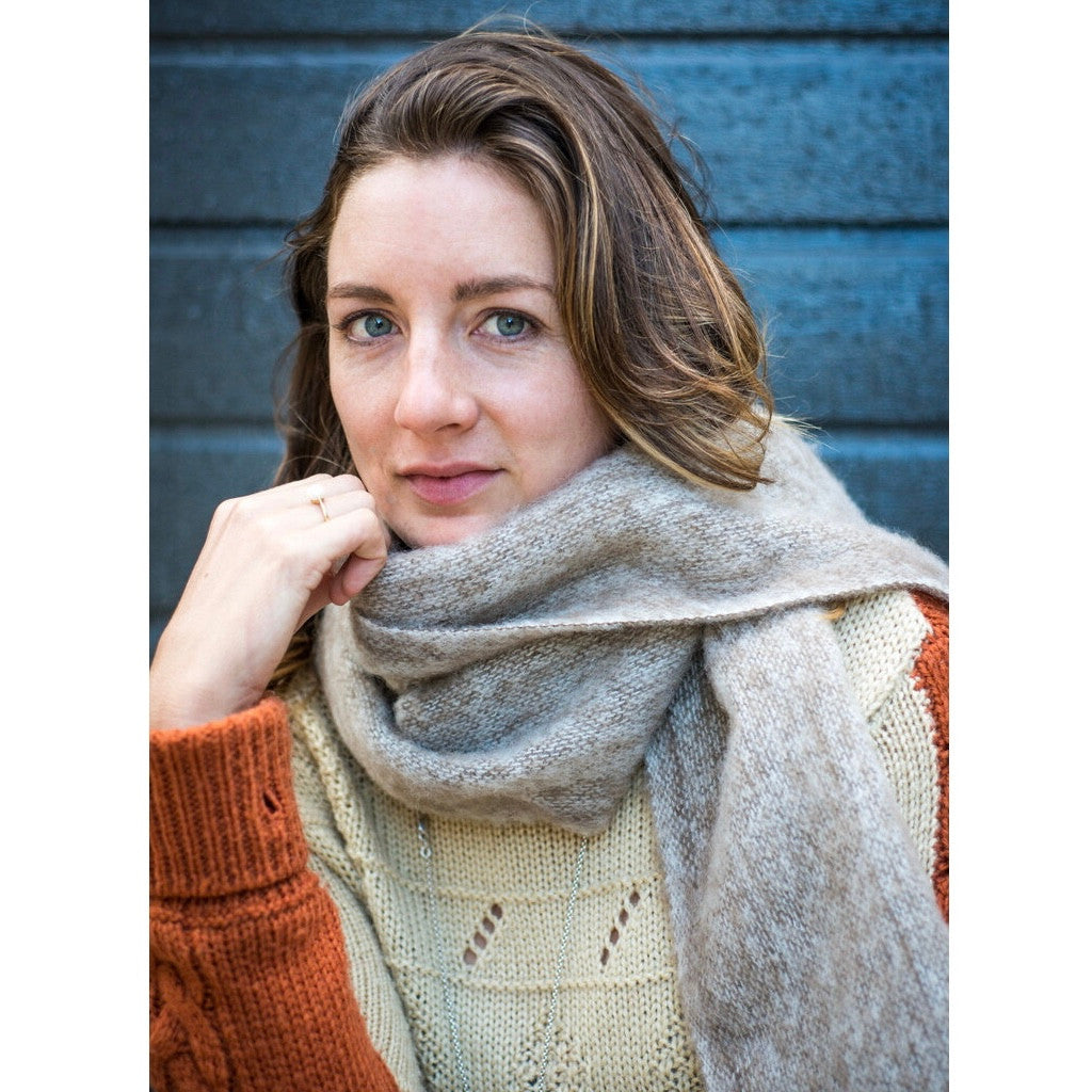 Woman wearing scarf in colour Pumice