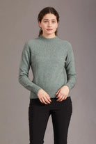 Model wearing Yoke neck cable jersey in colour Mint