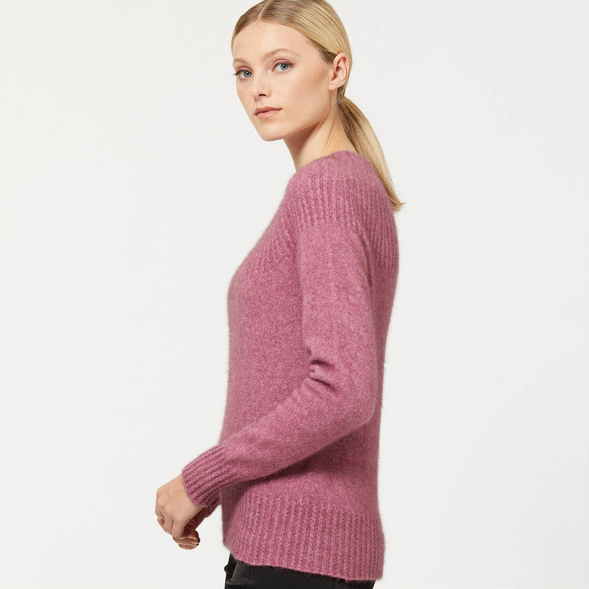 Heather colour cable jersey. Side view