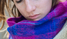 Woman wearing Alpaca fur scarf in Fuchsia Check